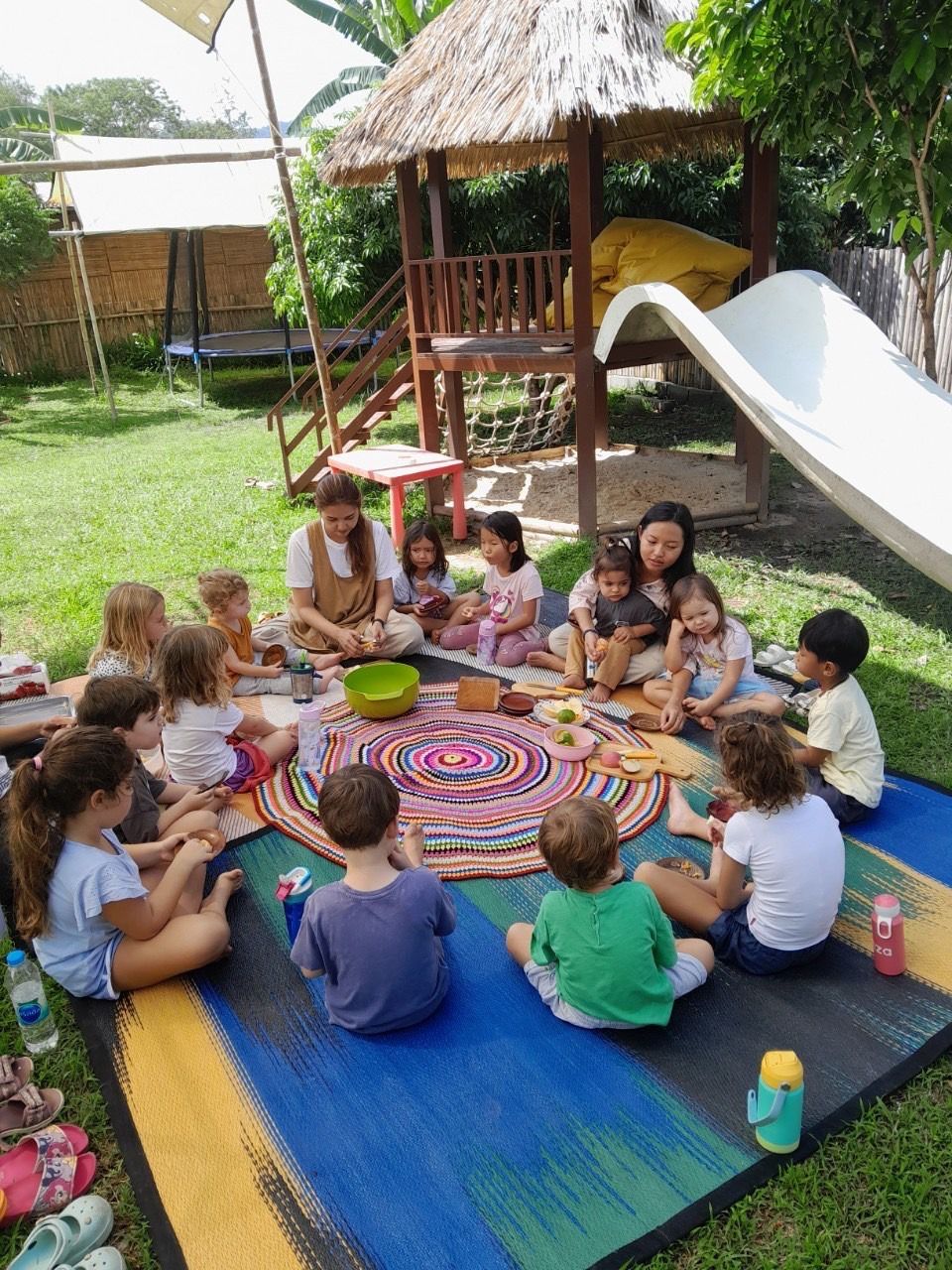 Teacher with children in circle